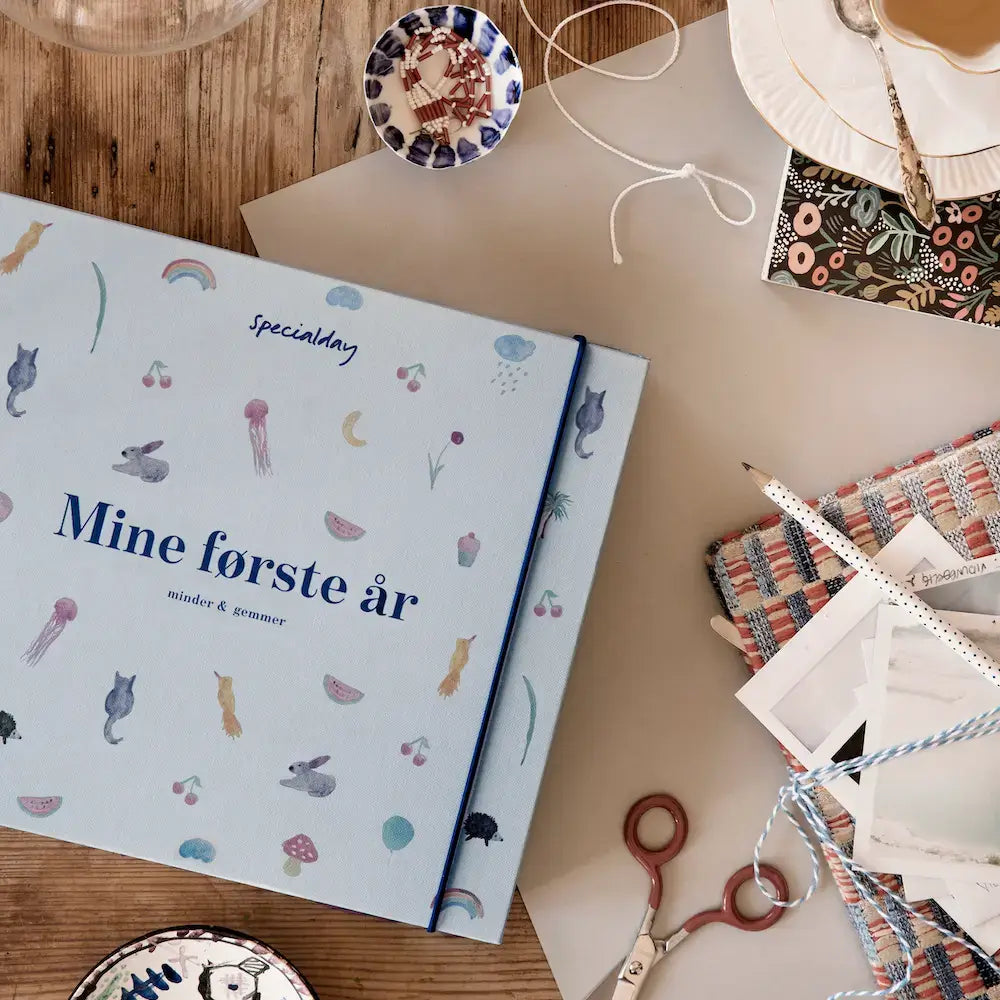barnets bog med ringbind – mine første år – blå album